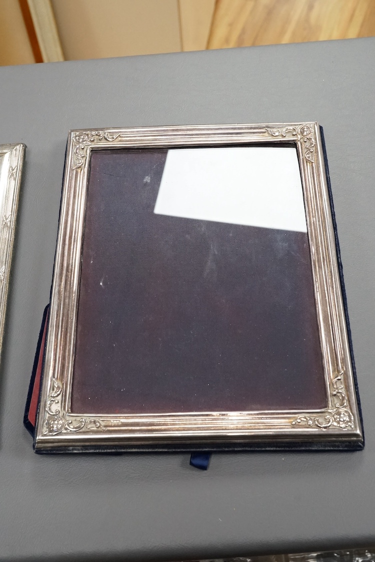 Two modern silver mounted rectangular photograph frames, including Britannia standard, by M&LS, London, 1989 and Keyford Frames Ltd, London, 1988, largest 26.1cm. Condition - poor to fair